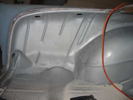 Passenger trunk wall blasted