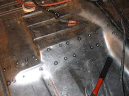 Plug welding floor brace