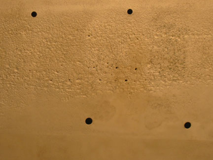 Pitting and holes revealed 2