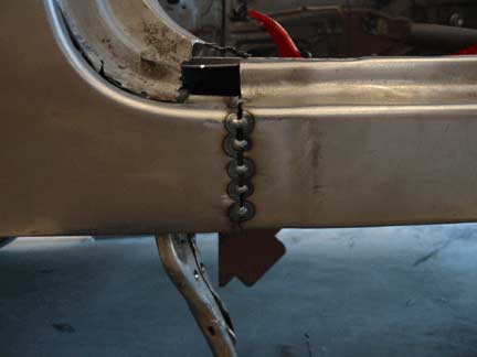 Tack welds quarter to rocker 1