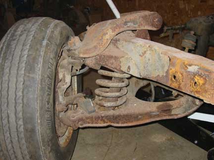 Front suspension with spring