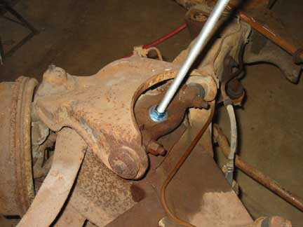 Rod installed through shock mount