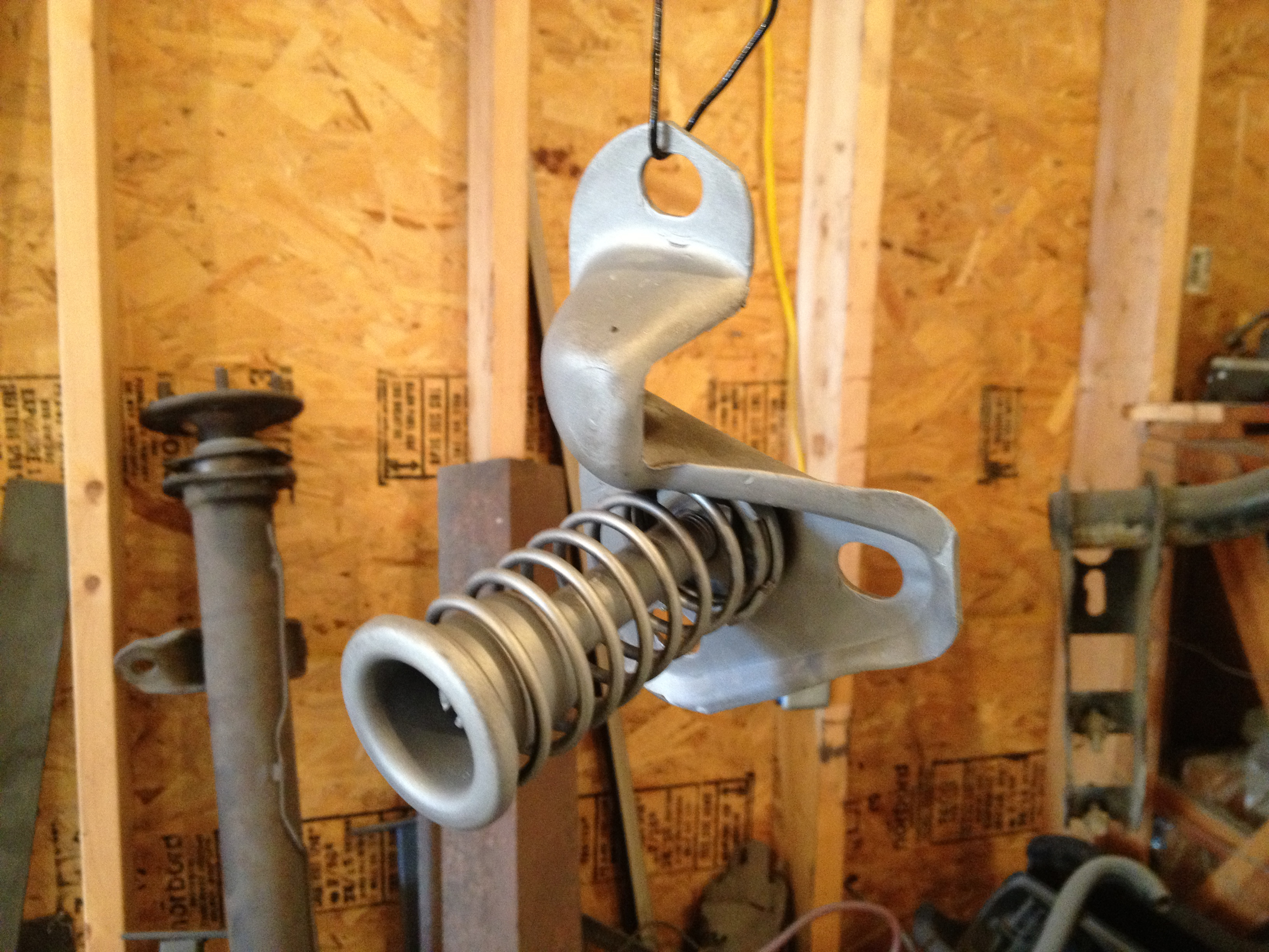 Hood latch striker