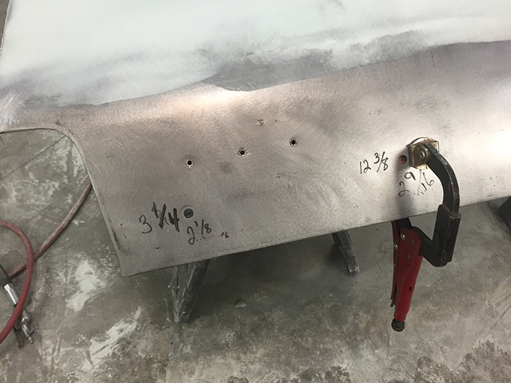 Dealer emblem holes